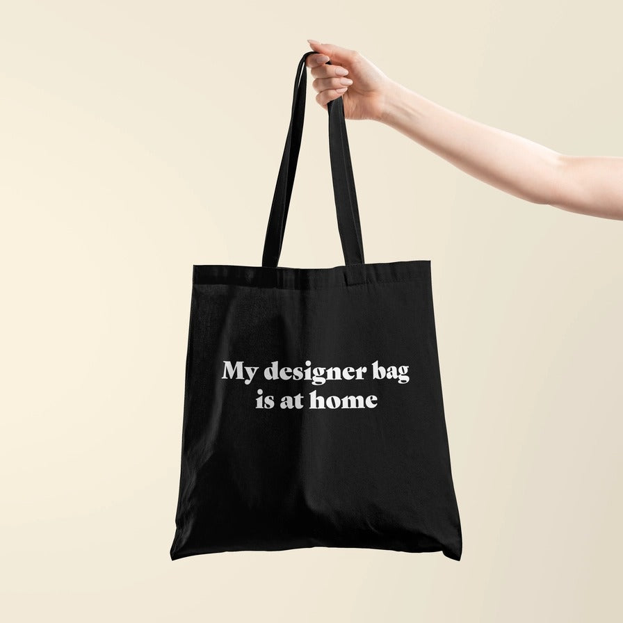 My designer bag is at home