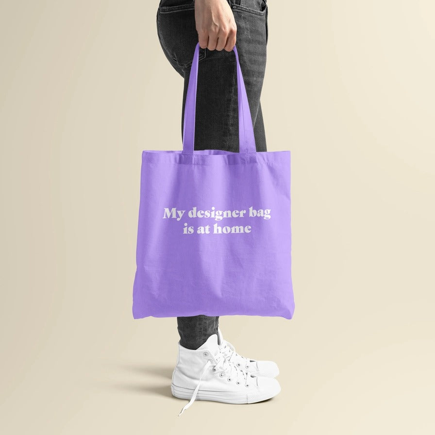 My designer bag is at home