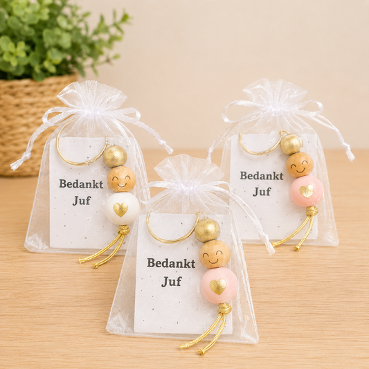 Gelukspoppetje met tekst Bedankt Juf